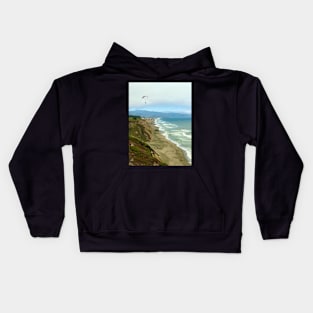 Paraglider above Pacific Ocean in California Kids Hoodie